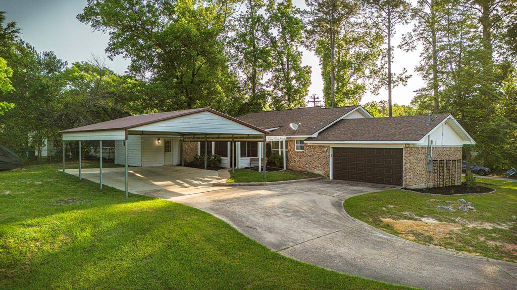 Expanded the driveway 2024 **403 E Lake Drive, Livingston, TX 77351**