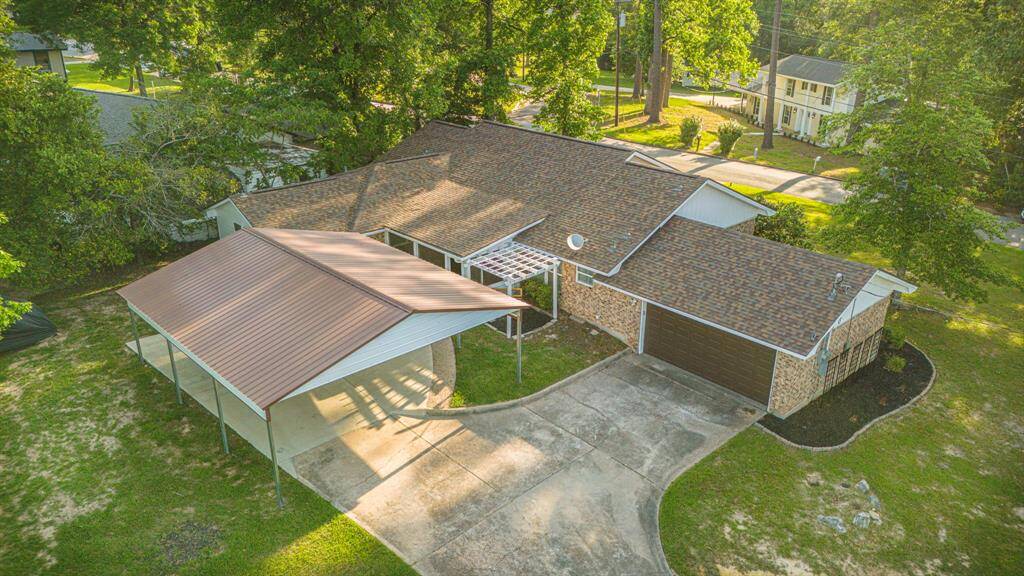 Ariel View of home, 2 Car Garage and Carport added 2024 **403 E Lake Drive, Livingston, TX 77351**