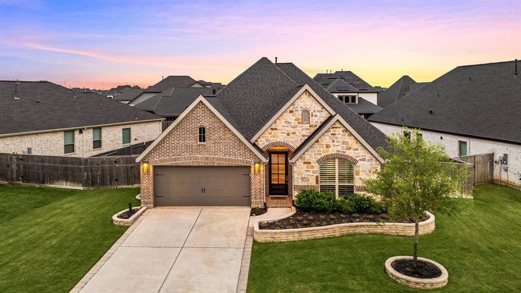 Welcome home to 4107 Maple Glen Drive located on a quiet street in Cross Creek Ranch and zoned to Lamar Consolidated ISD! This stunning home has lovely curb appeal, a well-manicured lawn, beautiful landscaping, stone & brick elevation, dark stained front door with glass detailing, covered front porch, traditional style, dark stained shutters, beautiful outdoor lanterns and a double wide driveway!
