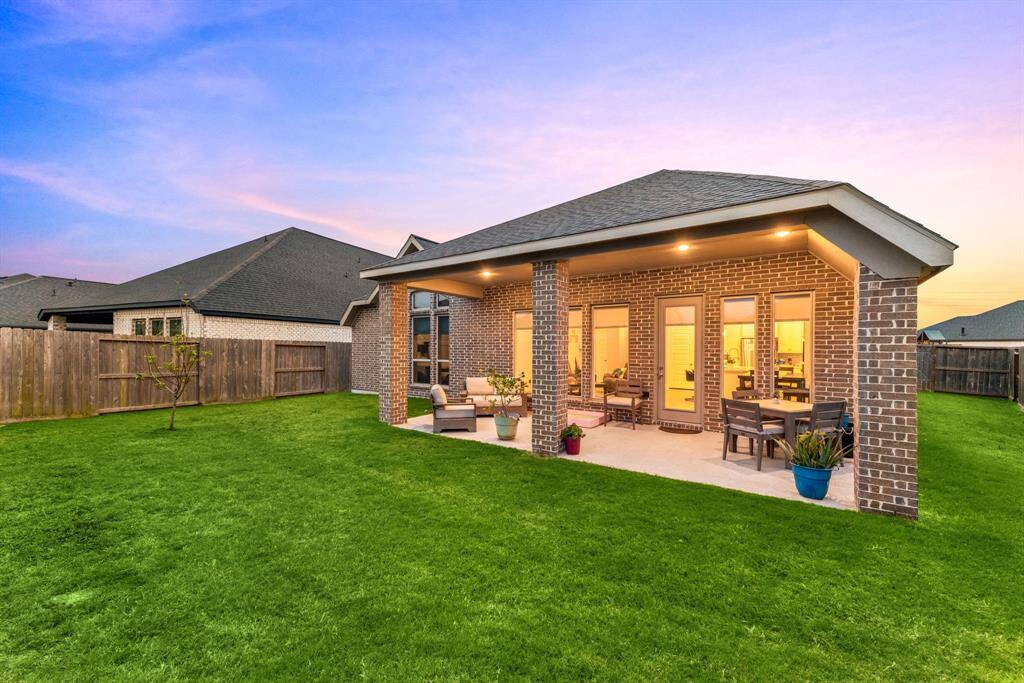 Sit back, relax and enjoy your gorgeous backyard under your large covered patio. Complete with recessed lighting, plenty of space for an outdoor kitchen or grilling station and outdoor seating. Your covered patio overlooks your huge backyard with plenty of green space for the kids and your furry friends to enjoy.