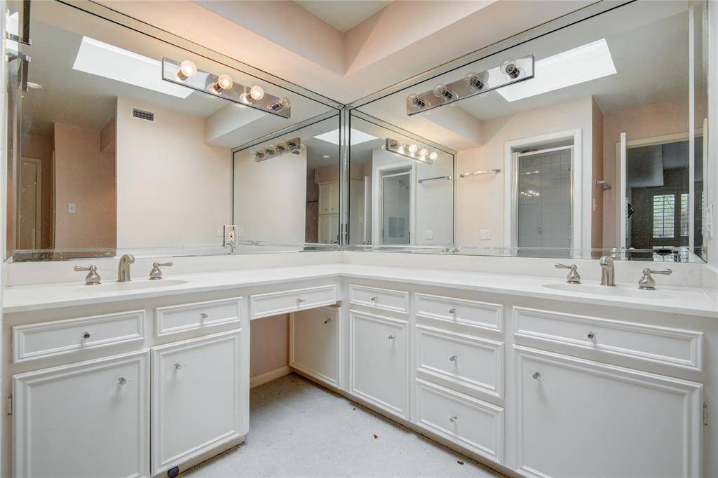 Large primary bathroom with vanity
