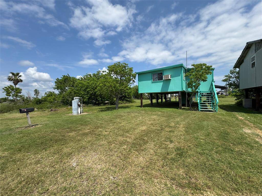 Charming 2-bedroom, 1-bathroom home featuring dedicated laundry and storage space. This unique offering also includes four additional lots—one riverfront and several along waterways—all located in the Palm Channel subdivision, providing incredible potential for expansion, investment, or creating your own private retreat.