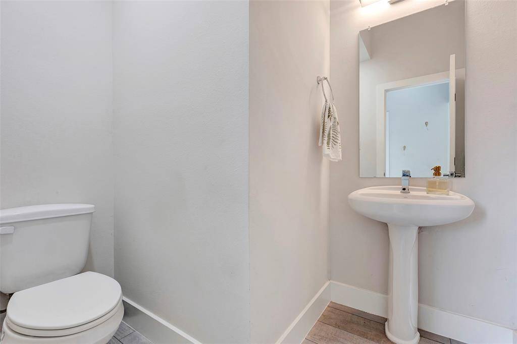Convenience at its best – a half bath on the first floor, perfect for guests and everyday living.