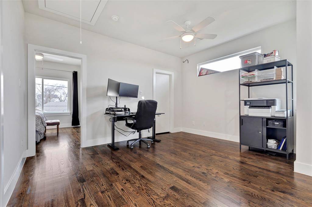 This spacious second floor flex space offers plenty of room to relax, with a convenient walk-in closet tucked away in the corner.