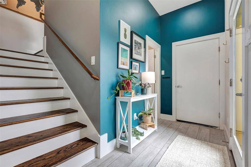 Step into comfort with a welcoming foyer and a beautiful staircase leading you to the second floor!