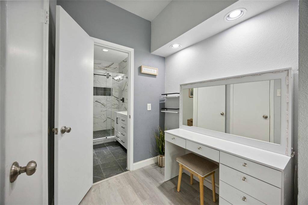 Vanity at the entrance of the primary bathroom.