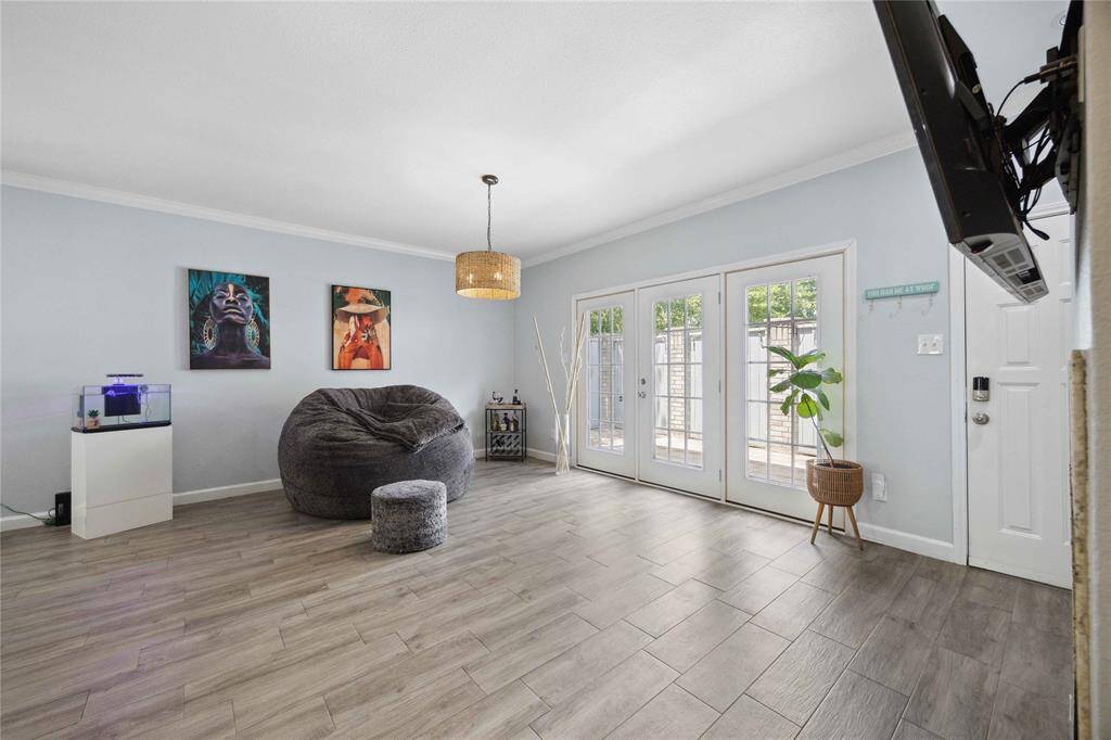 Spacious living/dining area with abundance of natural light.