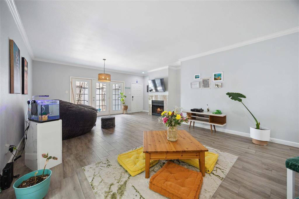 Spacious living/dining area with abundance of natural light.