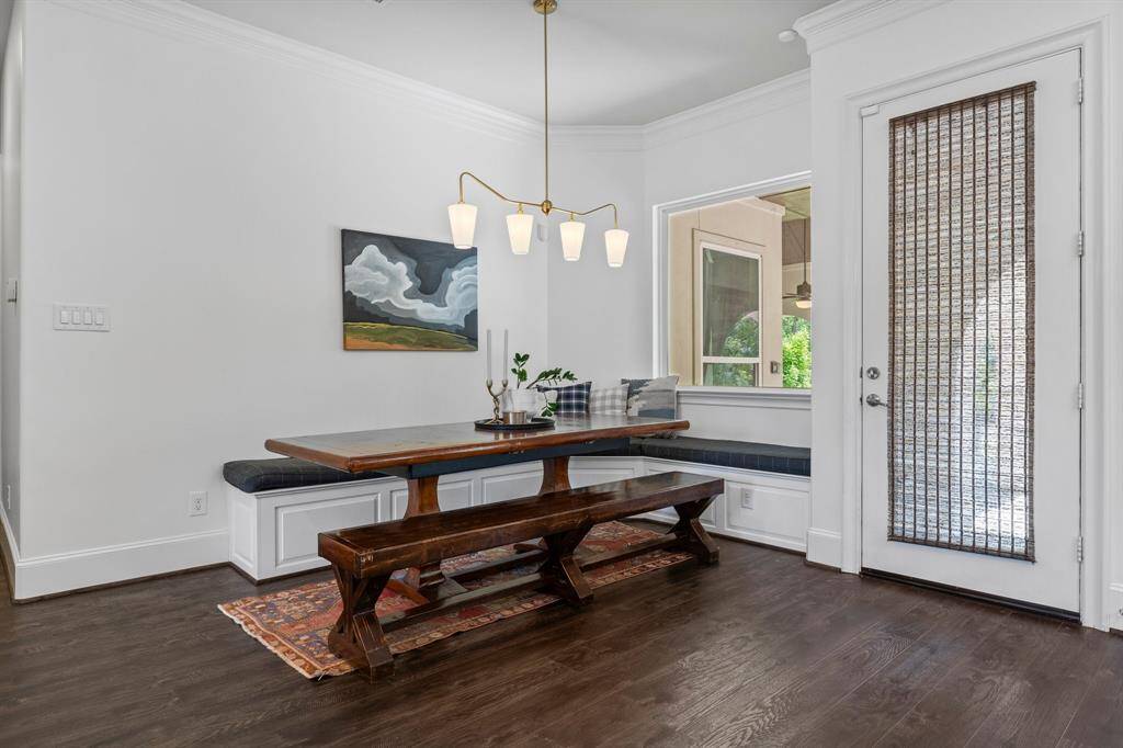 Breakfast area off the kitchen, modern lighting and fresh paint!