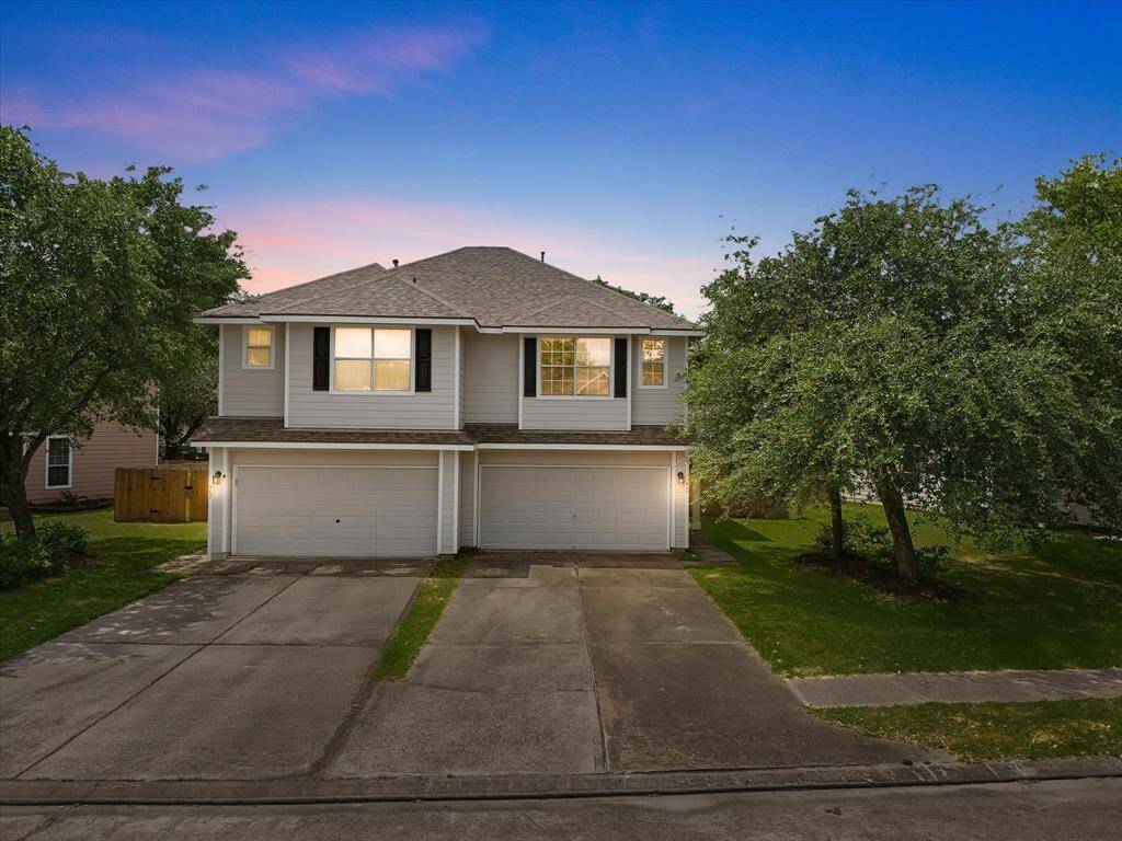 Front elevation facing east at twilight,