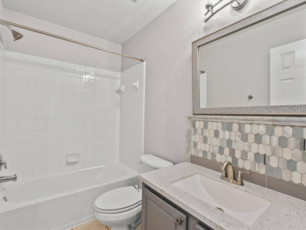 2nd floor full bathroom, with decor backsplash and sink