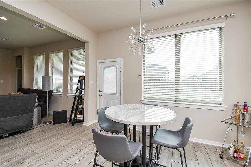 dining area with access to covered patio