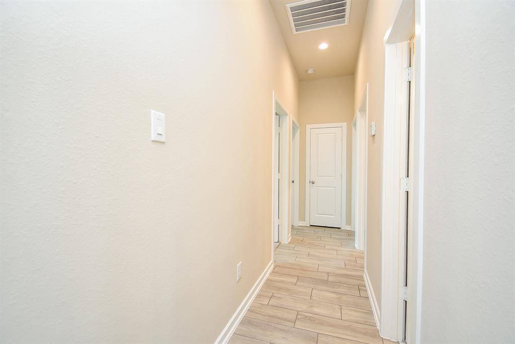 hallway to secondary beds, laundry etc.