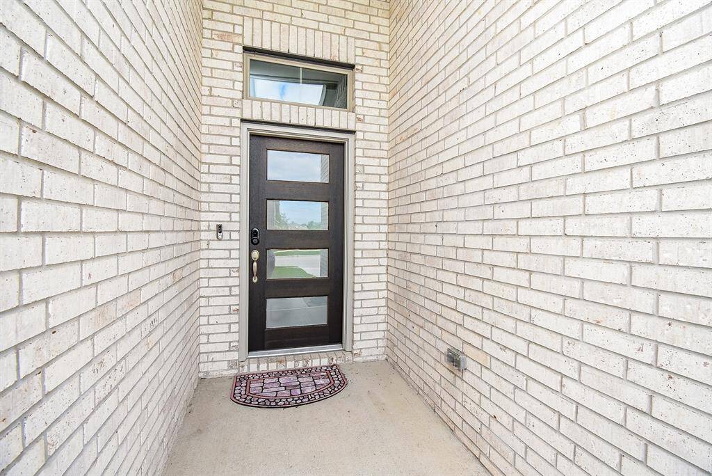 front door with modern glass dooor