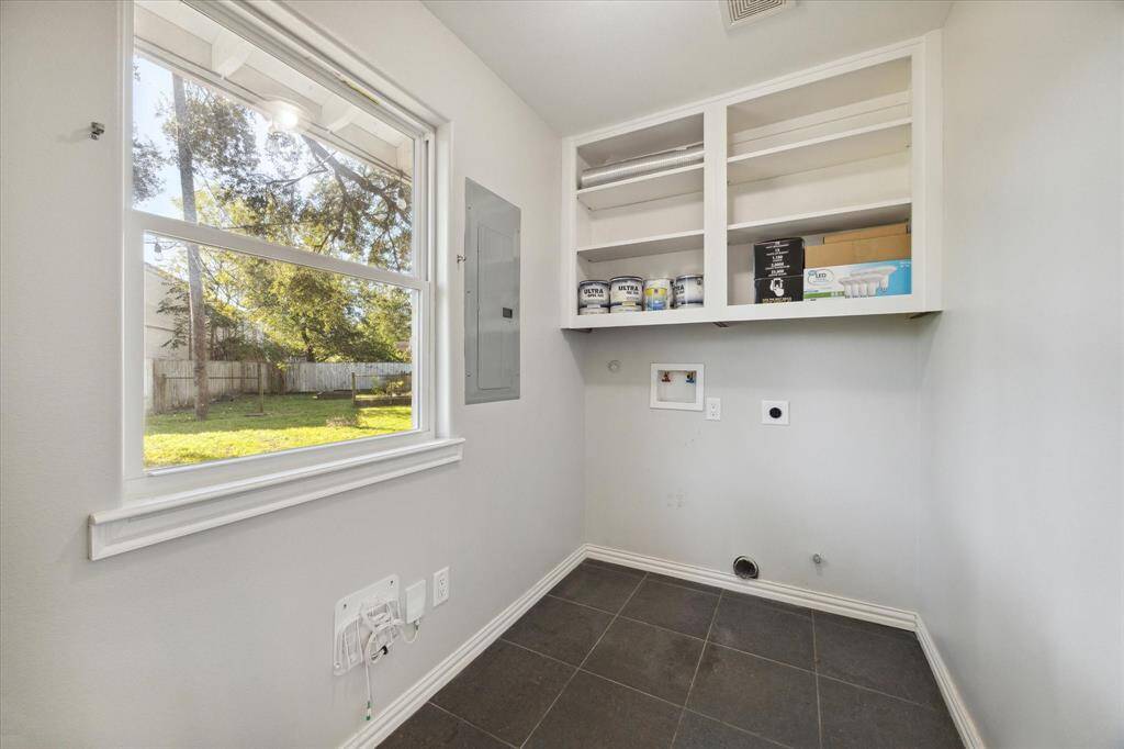 LAUNDRY ROOM- In house laundry room also has a door to the backyard.