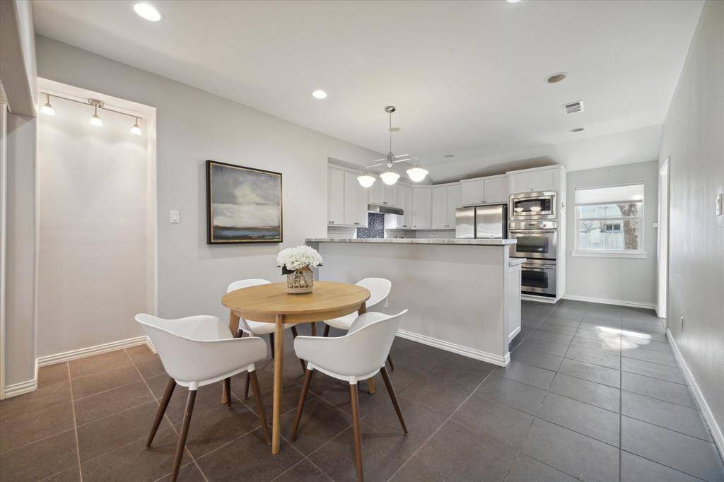 DINING AREA- Dining space is open to both the kitchen and the living area.