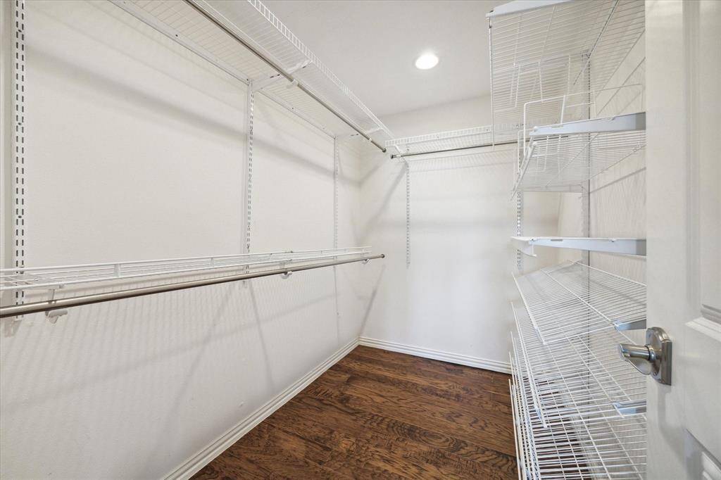 PRIMARY CLOSET- Walk-in closets are hard to find in these ranch style homes. This one does not disappoint!
