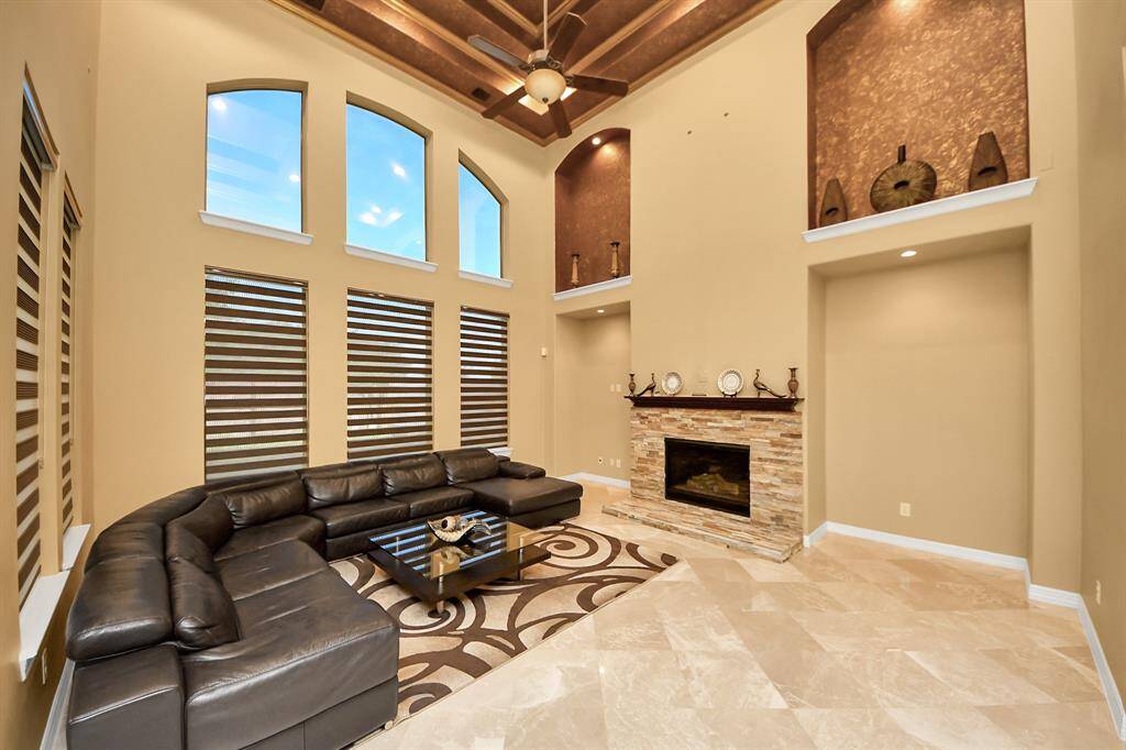 Another view of the family room with fireplace that could be used during those cold winters