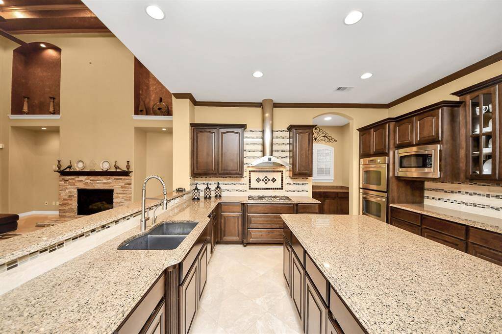 Facing the family room is the massive kitchen
