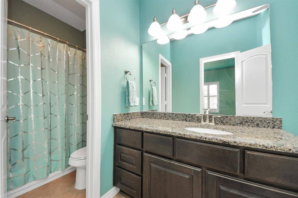 3rd full bathroom next tot he 4th bedroom