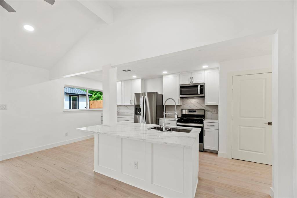 Large open living space is perfect for entertaining.