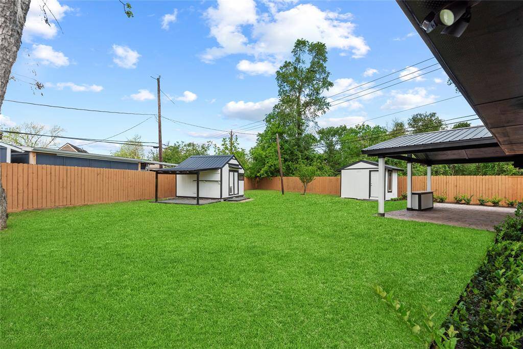 This large backyard will make you feel like you are at the park.