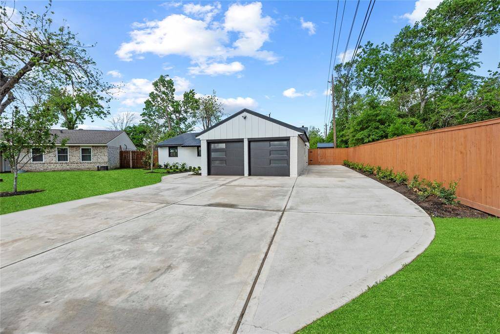 Large extended driveway perfect for parking all the toys!