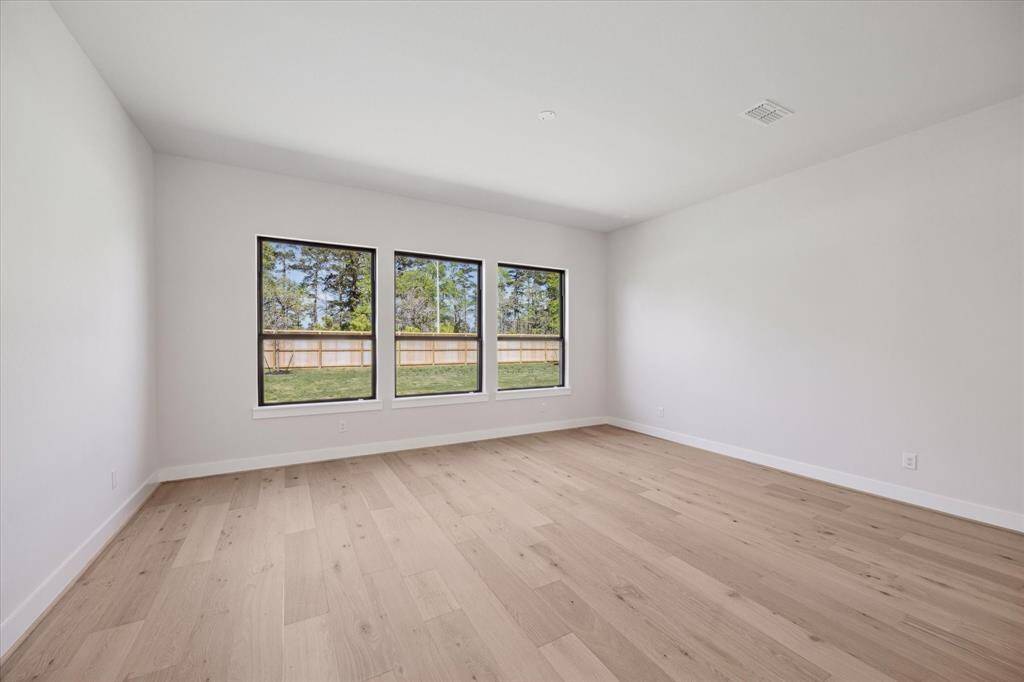 Game Room/Flex Space, off of Kitchen, with direct access to Back Porch
