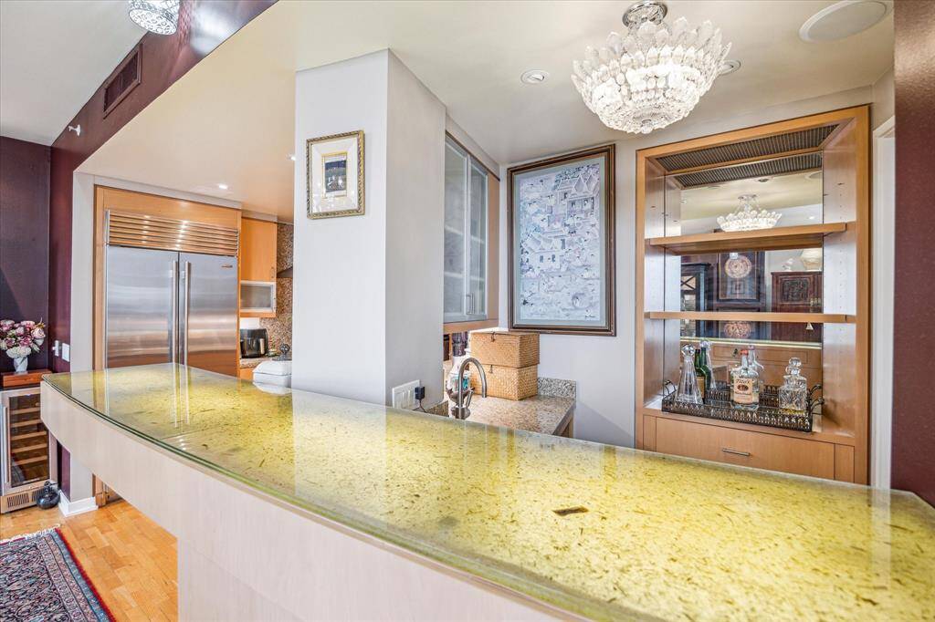 What an interesting lighted countertop for the bar!