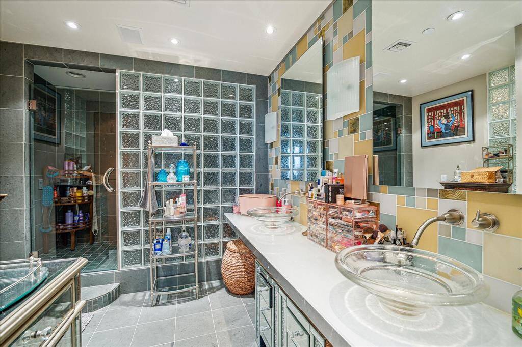 View of the bath area looking toward the spacious shower.