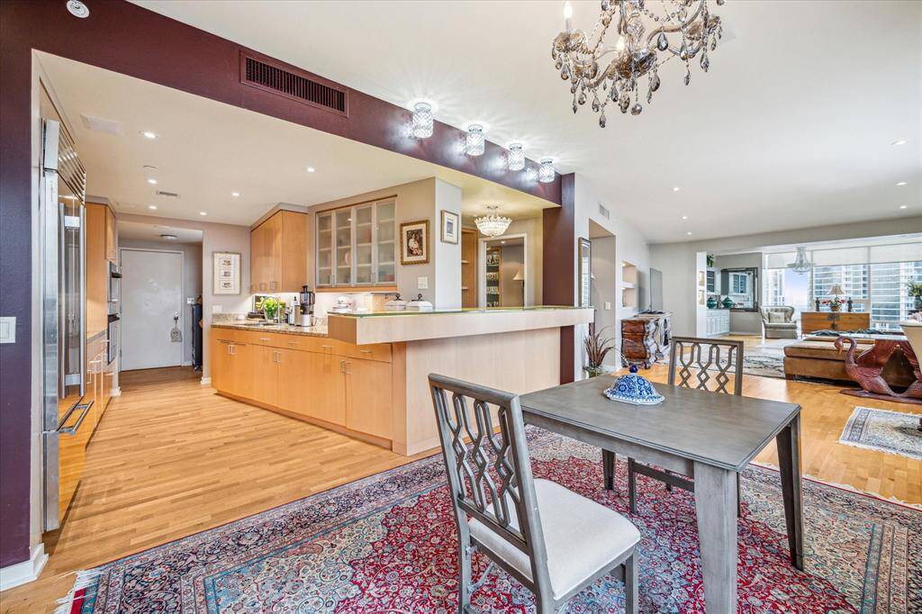 Beautiful recent custom cabinets offer extensive storage as well as counter space.