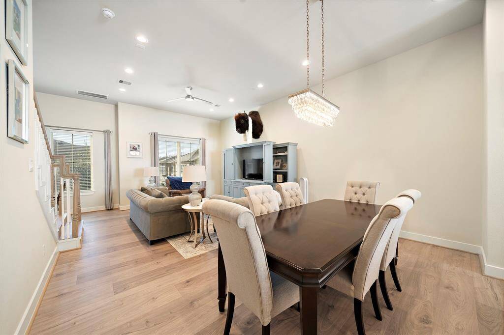 The kitchen opens up to this spacious dining room.