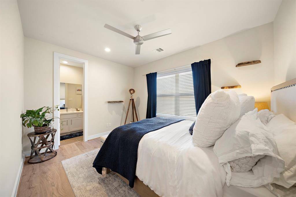 Secondary bedroom includes a walking closet and attached full bath.