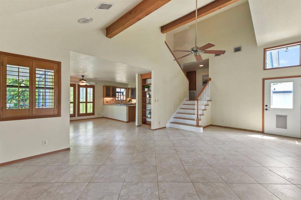 This inviting space seamlessly connects the kitchen and dining area, perfect for entertaining and family gatherings.