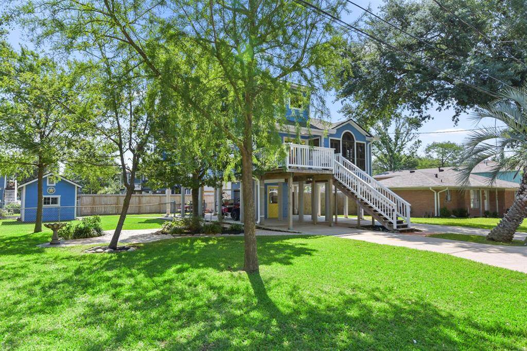 Experience the outdoors on this spacious double lot.