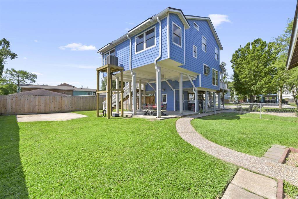 The exterior features a versatile concrete pad, perfect for your dream "toy shed.