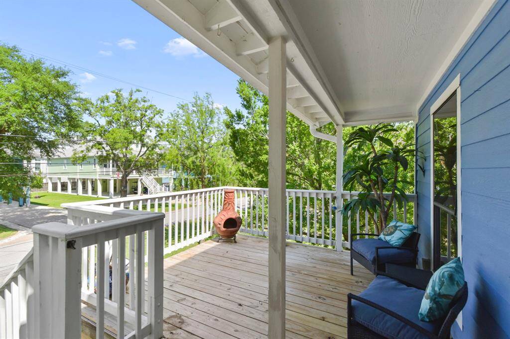 Cozy up by the outdoor chimney on cool nights or savor your morning coffee on the inviting porch.