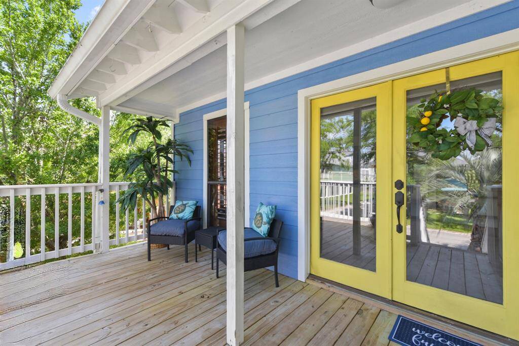 Elegant double French doors offer a grand entrance and open fully to welcome you home.
