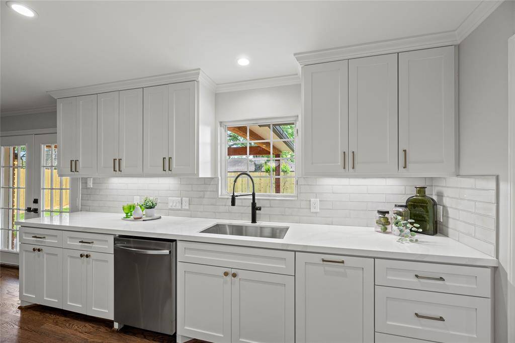 Lots of cabinets and counter space, with great under cabinet lighting and a large sink.