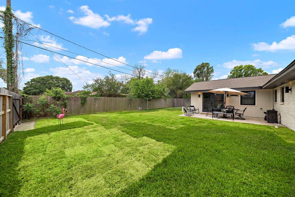 Recently re-sodded back yard has more than enough room for outdoor entertaining.  Perhaps a new pool?