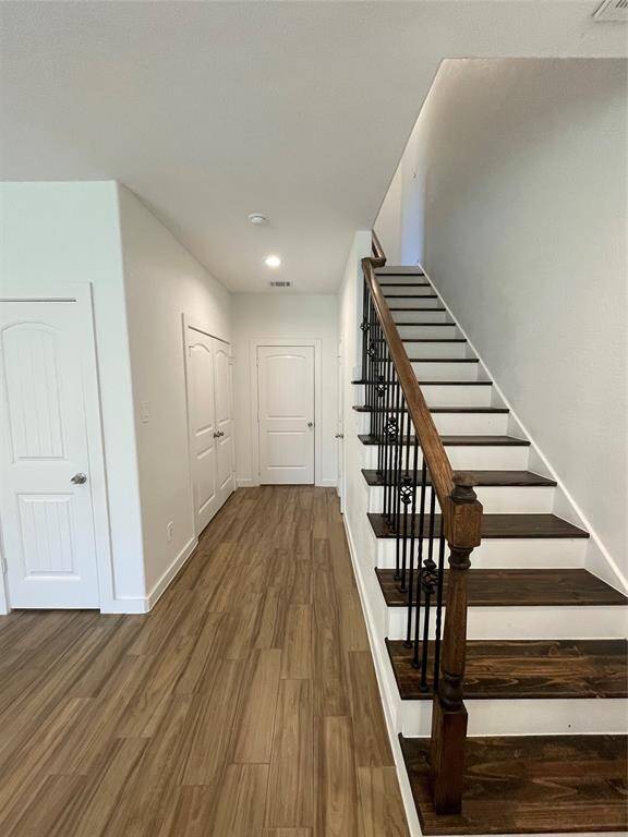 View to garage and stairwell to upstairs bedrooms