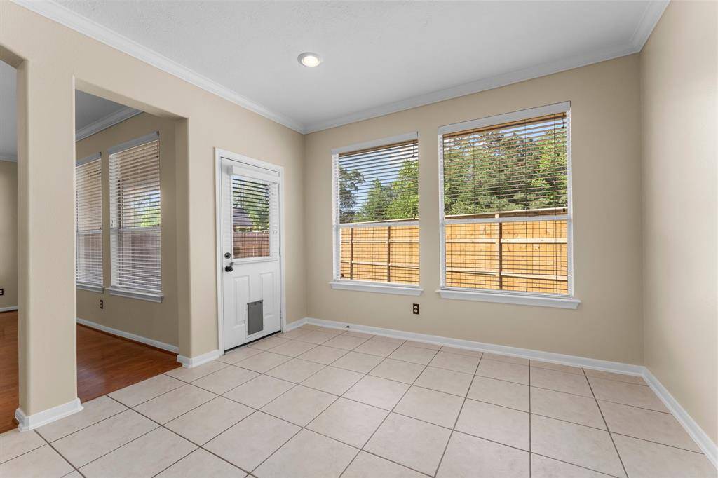 Breakfast area with easy access to the kitchen. Great view of no back neighbors.