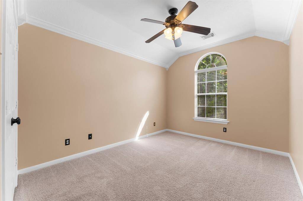 Bedroom 2 at the front of the home.