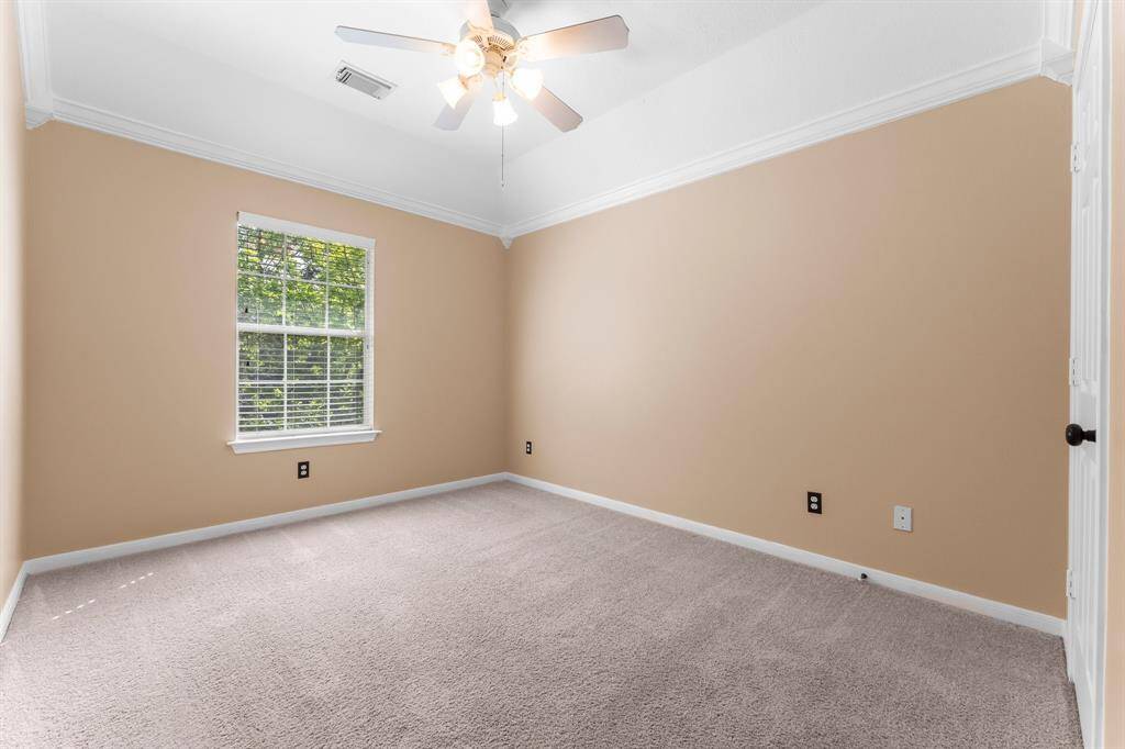 Bedroom 3 at the front of the home.