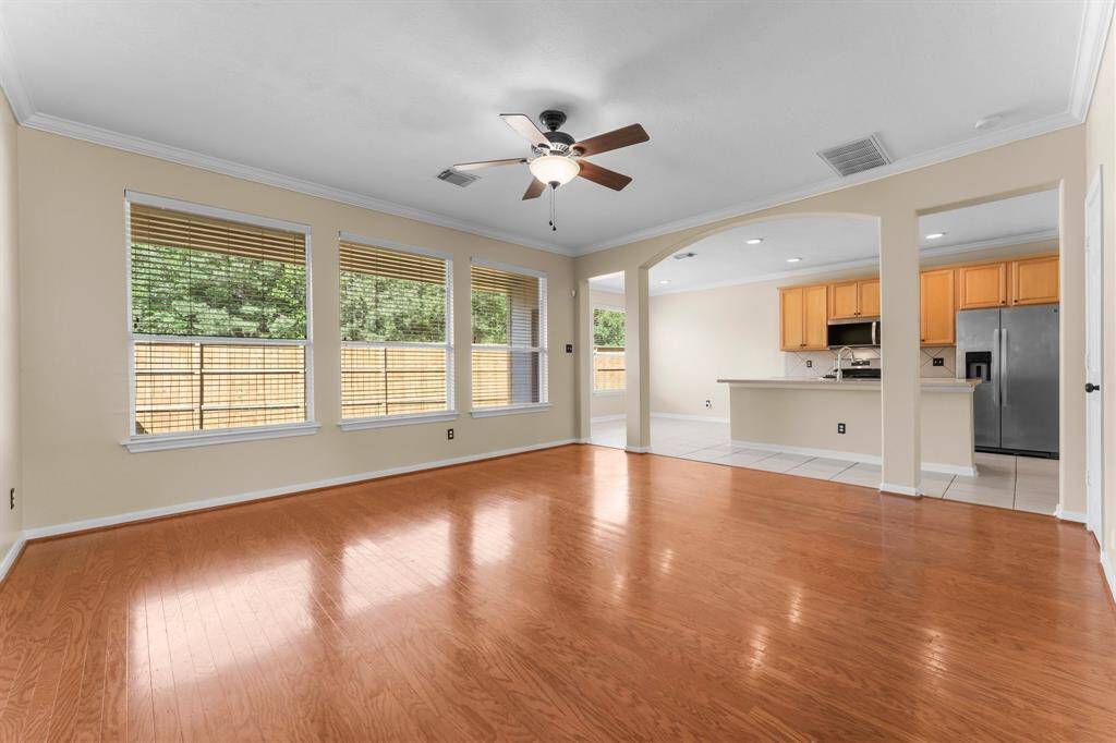 Open floor plan makes this space great for entertaining. Notice all the windows for natural light.