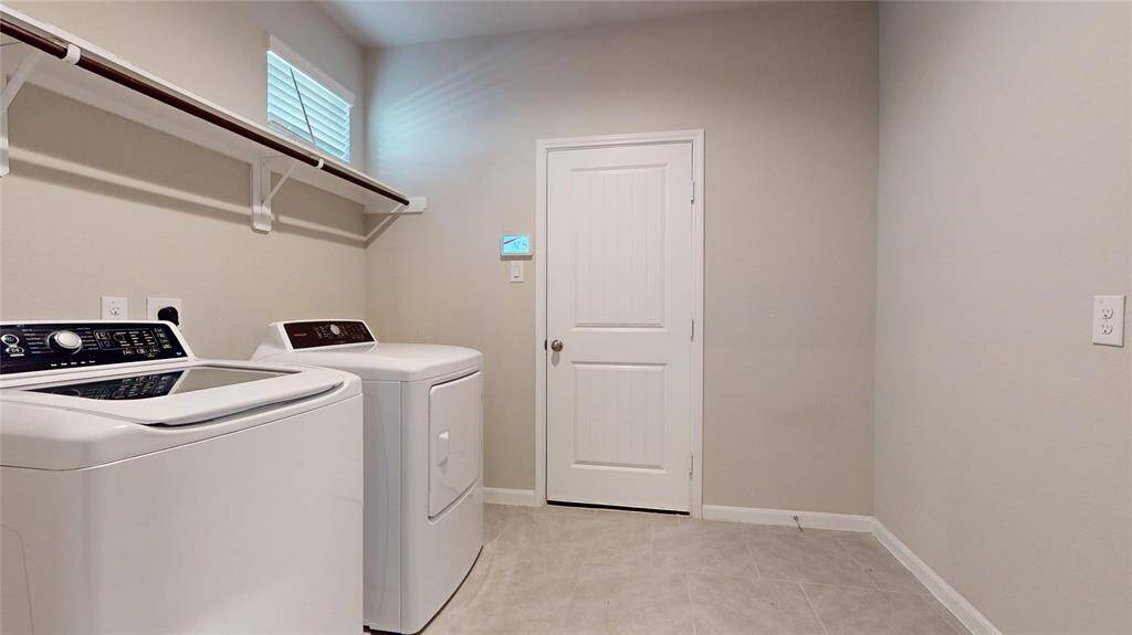 Laundry and mud room/drop zone.  The door in the background leads to the two car attached garage.