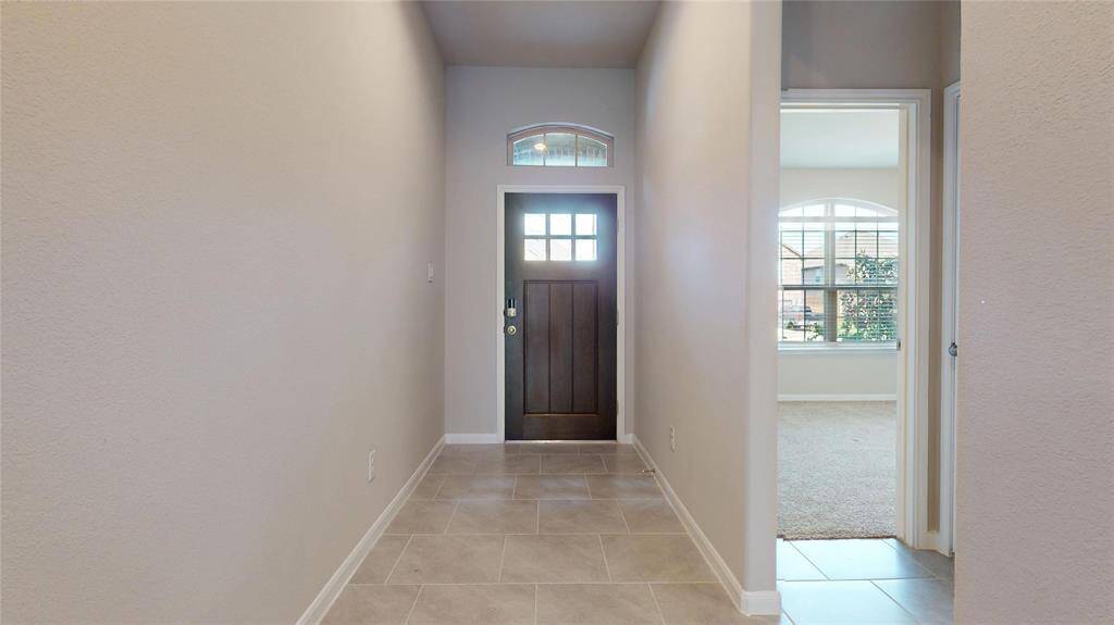 The Foyer. 10-foot ceilings in most of the living area give it a open, airy and grand feeling.