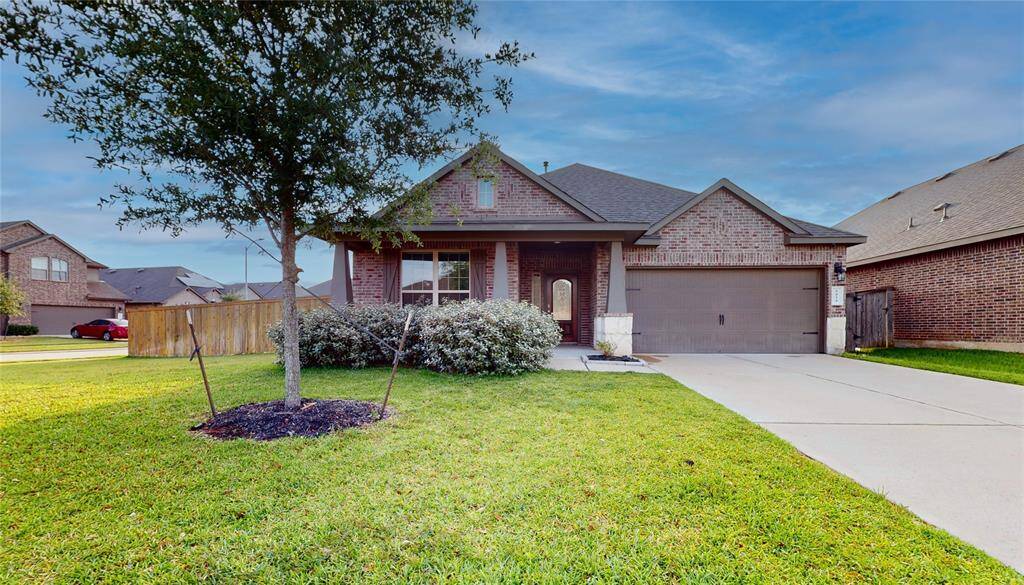 5434 Wildbrush Drive is located on a large corner lot in the Long Meadow Farms community. Welcoming front porch with room for seating.