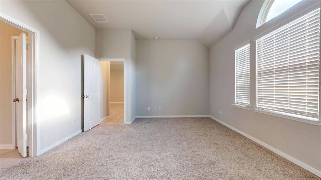 Third view of the primary bedroom.