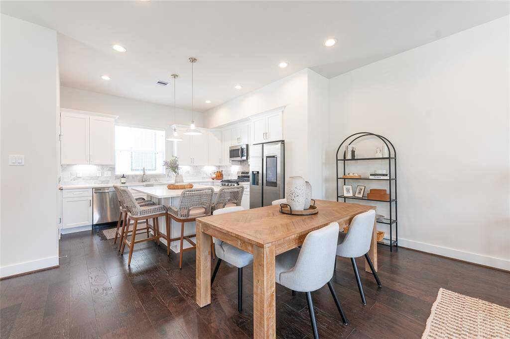 Spacious and modern kitchen-dining area with sleek finishes and ample natural light. Perfect for entertaining and everyday living.